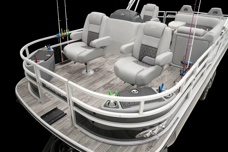Slide: The Image of 2024 Ranger Reata 223F pontoon boat interior with plush seating and fishing rod holders. - 23