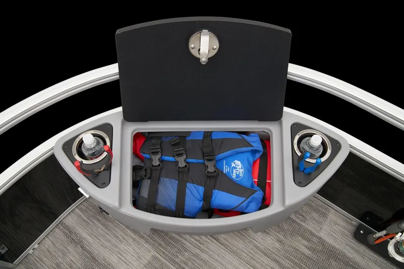 Slide: The Image of 2024 Ranger Reata 223F boat storage compartment with life jacket and cup holders. - 28