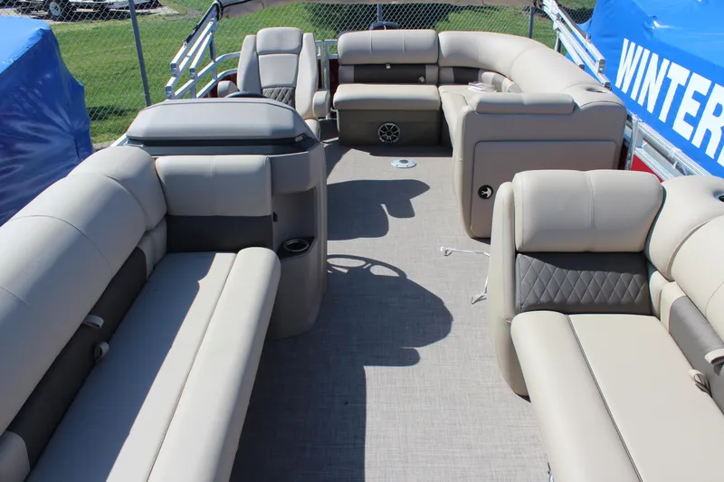 Slide: The Image of 2024 Sun Tracker Party Barge 20 DLX interior with spacious seating and modern design. - 2
