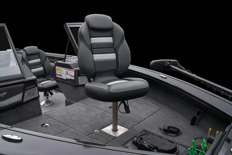 Slide: The Image of 2024 Ranger VX1888 WT boat interior with cushioned seats and storage compartments. - 27