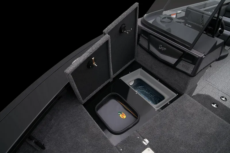 Slide: The Image of 2024 Ranger VX1888 WT boat interior with storage compartments and livewell. - 38
