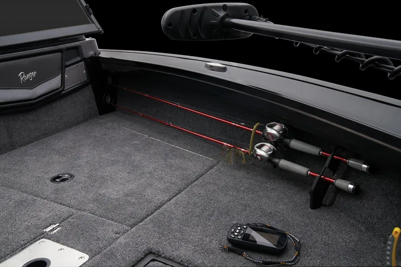Slide: The Image of 2024 Ranger VX1888 WT boat interior with fishing rods and equipment. - 42