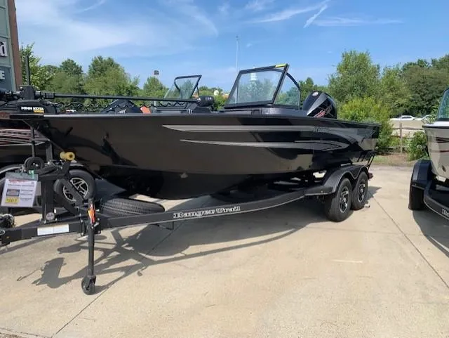 Slide: The Image of 2024 Ranger VX1888 WT black fishing boat on a trailer. - 5