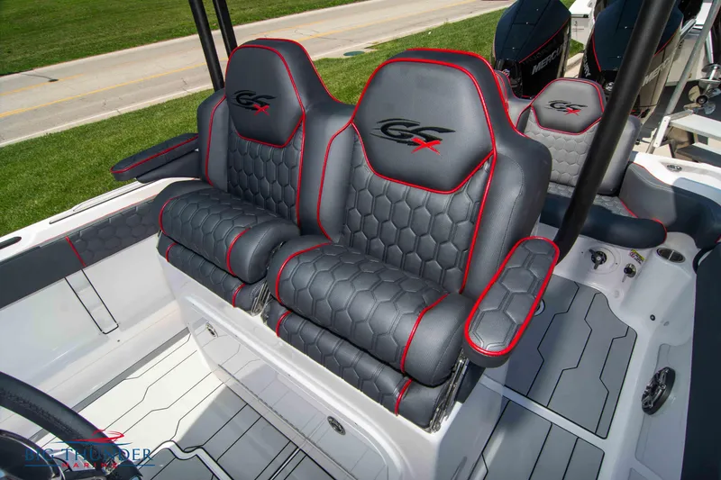 Slide: The Image of 2024 Glasstream 28 GSX Pro boat seats with red accents and hexagonal pattern. - 17