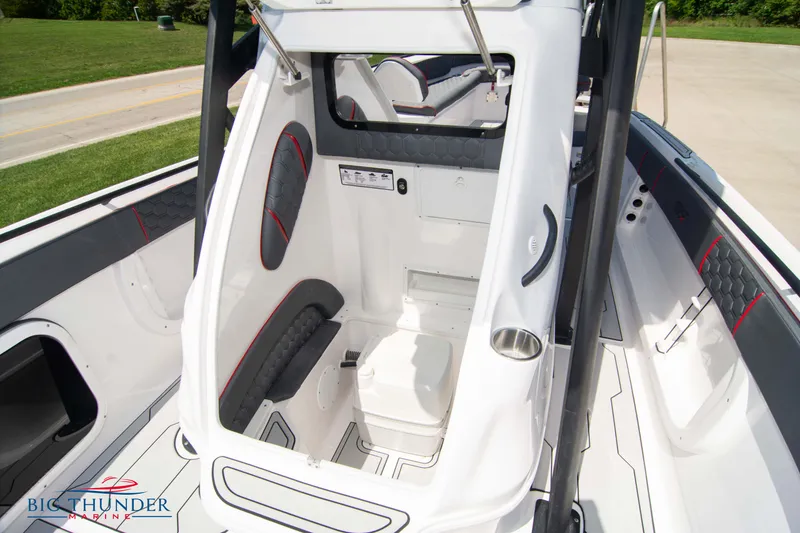 Slide: The Image of 2024 Glasstream 28 GSX Pro boat interior with seating and storage compartments. - 22