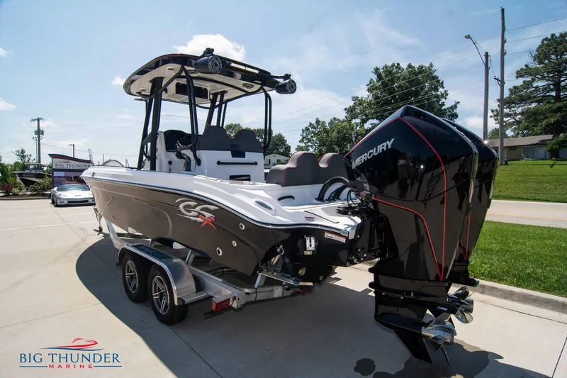 Slide: The Image of 2024 Glasstream 28 GSX Pro boat on trailer with Mercury outboard engine. - 5