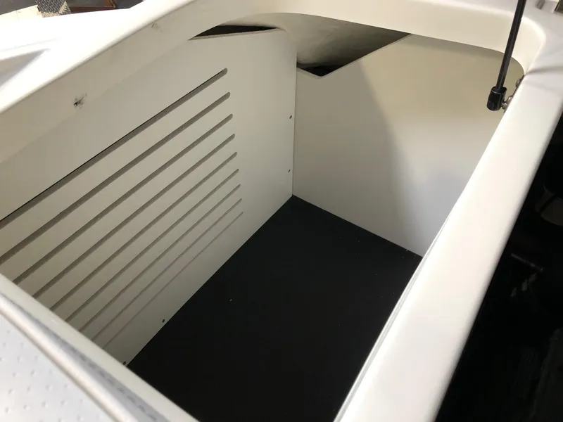 Slide: The Image of Storage compartment of 2023 Sea Ray SPX 210 boat. - 13