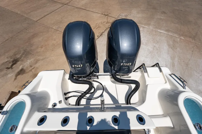Slide: The Image of 2021 Key West 244 Center Console with dual 150 horsepower engines. - 29