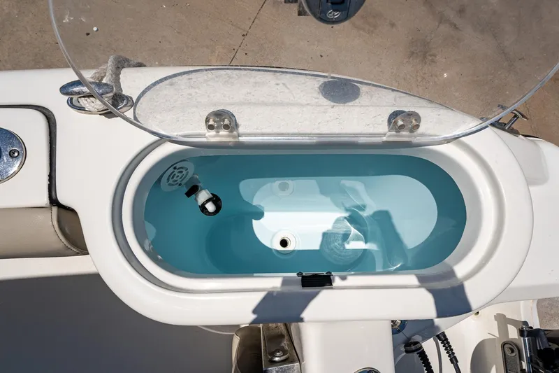 Slide: The Image of Livewell on 2021 Key West 244 Center Console boat, open lid view. - 27