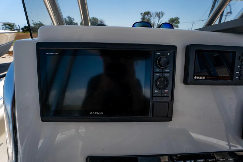 Slide: The Image of Garmin display on 2021 Key West 244 Center Console boat dashboard. - 34