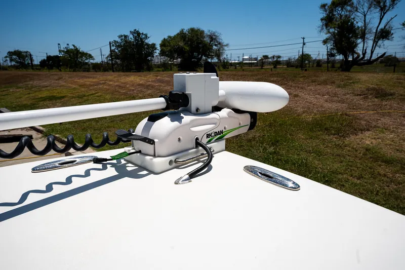 Slide: The Image of 2021 Key West 244 Center Console boat with mounted trolling motor. - 46
