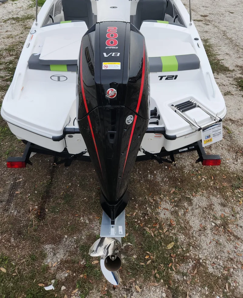 Slide: The Image of 2024 Tahoe T21 boat with powerful V8 engine, rear view. - 5