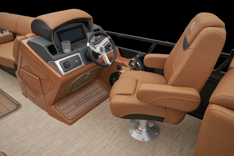 Slide: The Image of 2024 Regency 250 LE3 boat captain's chair and helm station. - 27