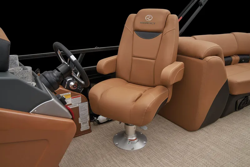 Slide: The Image of 2024 Regency 250 LE3 captain's chair and helm station. - 33