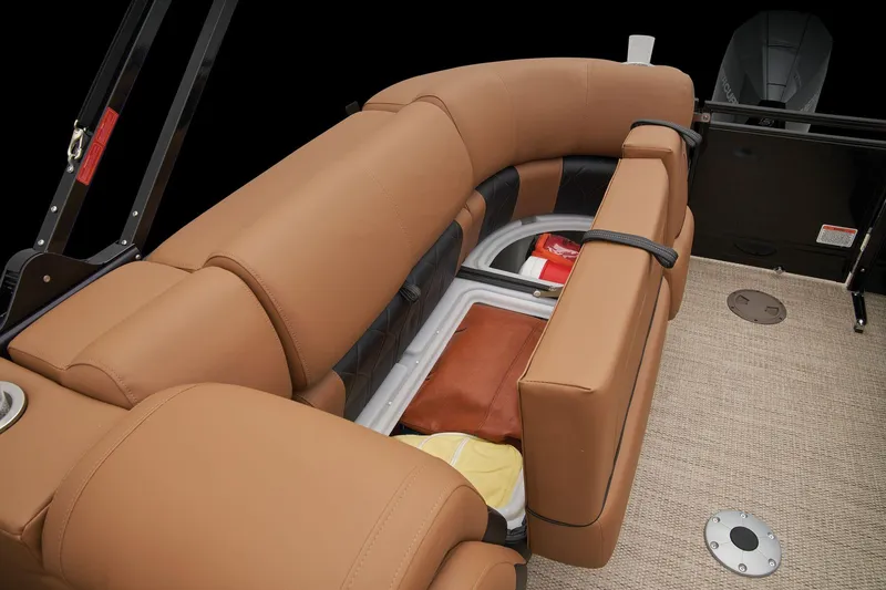 Slide: The Image of 2024 Regency 250 LE3 boat with tan leather seating and under-seat storage. - 47