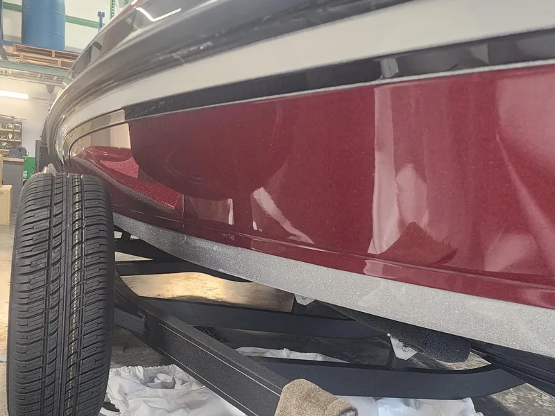 Slide: The Image of 2024 Ranger Z520R Ranger Cup Equipped boat on trailer, close-up view. - 2