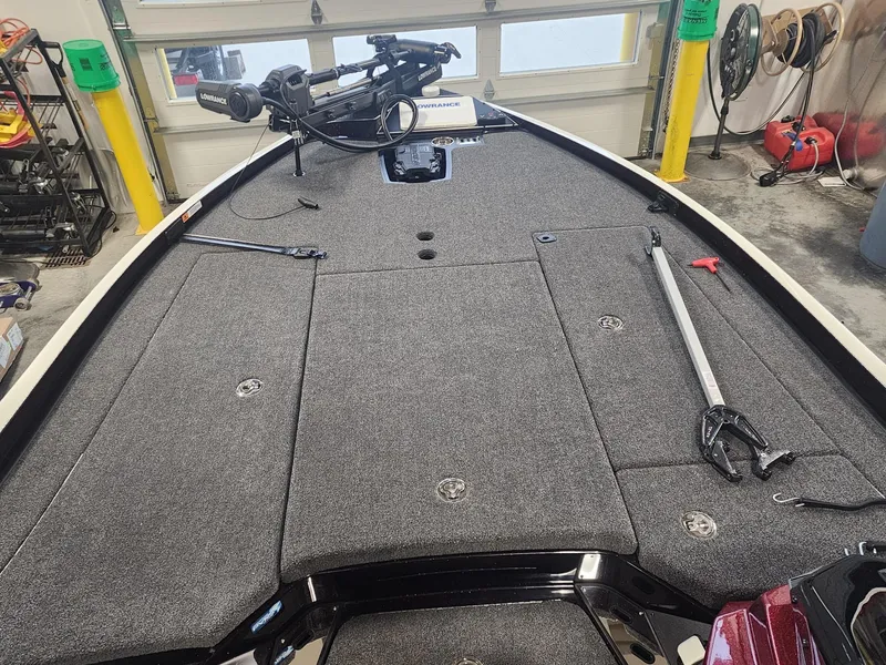 Slide: The Image of 2024 Ranger Z520R Ranger Cup Equipped boat interior in a garage. - 4