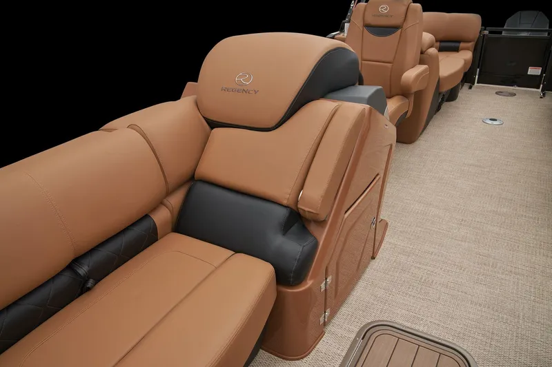 Slide: The Image of 2024 Regency 250 LE3 boat interior with luxurious tan and black leather seating. - 16