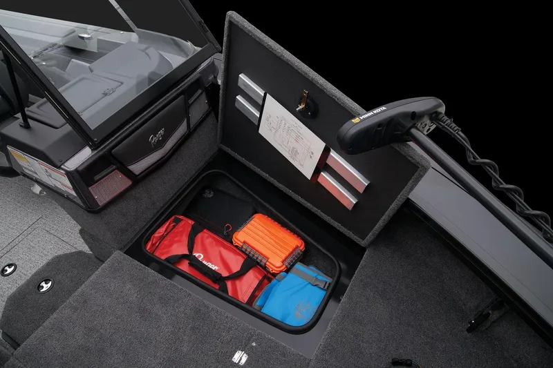 Slide: The Image of 2024 Ranger VX1888 WT boat storage compartment with safety gear and equipment. - 32