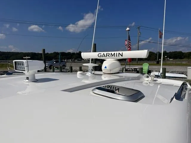 Slide: The Image of 2022 Pursuit OS 355 boat with Garmin radar and navigation equipment. - 5