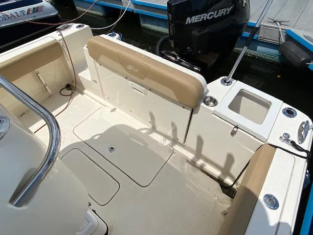 Slide: The Image of 2020 Scout 235 XSF boat interior with Mercury outboard motor. - 10