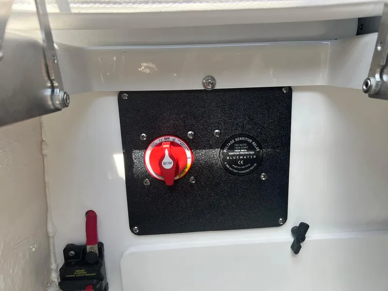 Slide: The Image of Control panel of a 2024 Crownline 260SS boat. - 12