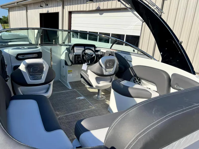 Slide: The Image of 2024 Crownline 260SS boat interior with modern seating and dashboard. - 3