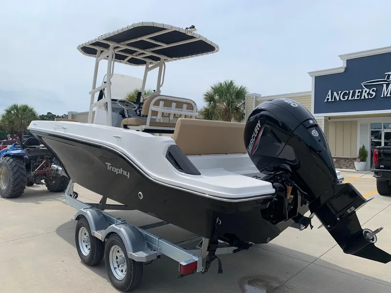 Slide: The Image of 2024 Bayliner Trophy 20 CC boat on trailer at Anglers Marine dealership. - 3
