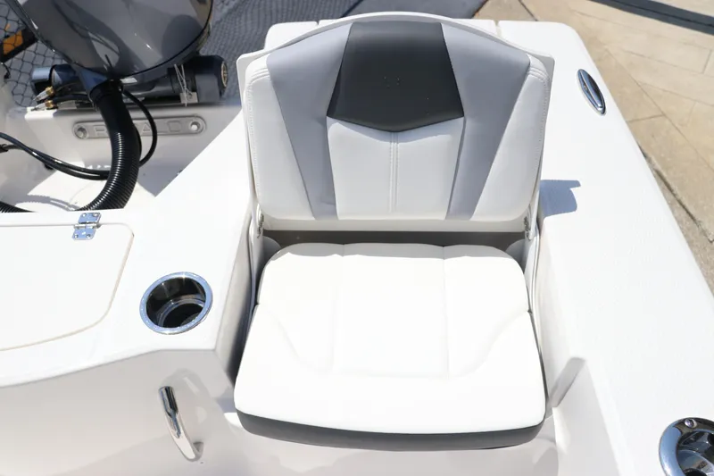 Slide: The Image of 2024 Robalo 206 Cayman boat seat with sleek white and gray design. - 14
