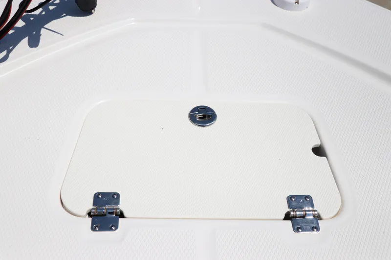 Slide: The Image of 2024 Robalo 206 Cayman boat hatch with secure latch and hinges. - 35