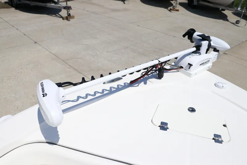 Slide: The Image of 2024 Robalo 206 Cayman boat with trolling motor on deck. - 37