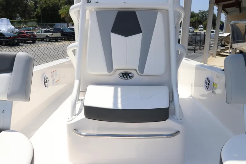 Slide: The Image of 2024 Robalo 206 Cayman boat interior with cushioned seating and sleek design. - 38