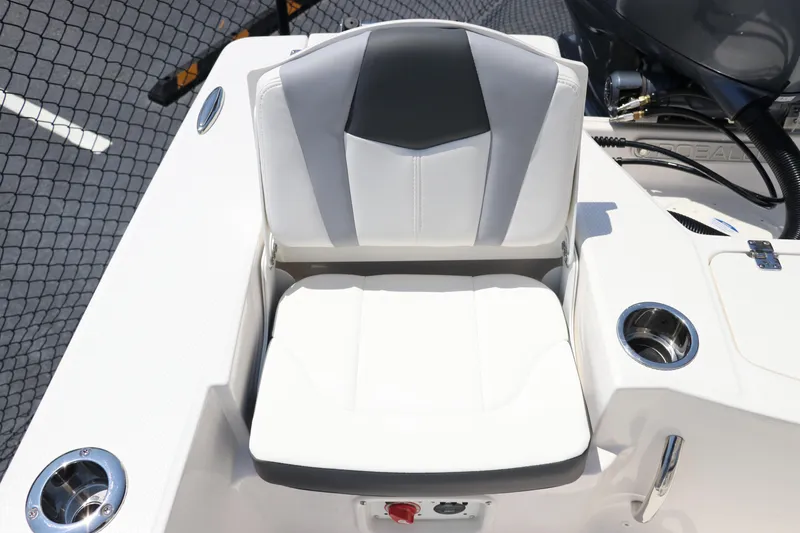 Slide: The Image of 2024 Robalo 206 Cayman boat seat with cup holders and sleek design. - 9