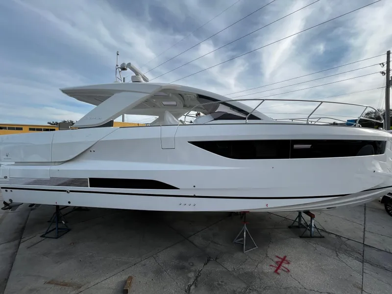 Slide: The Image of 2024 Jeanneau DB/43 OB luxury motor yacht on dry dock. - 0