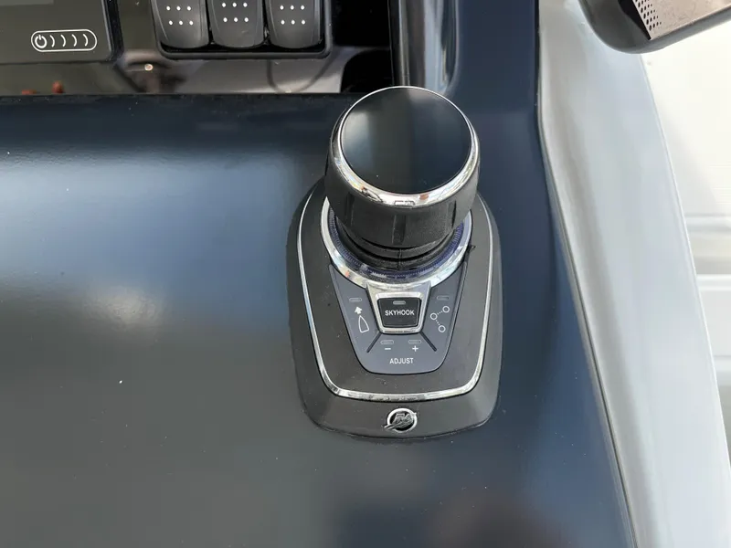 Slide: The Image of Joystick control on 2024 Jeanneau DB/43 OB boat dashboard. - 14