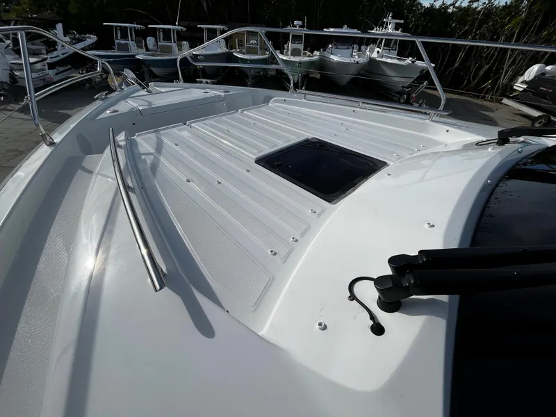 Slide: The Image of 2024 Jeanneau DB/43 OB boat deck with hatch and railing. - 16