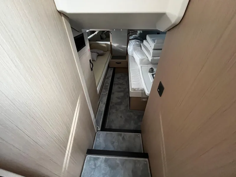 Slide: The Image of 2024 Jeanneau DB/43 OB interior cabin with modern design and comfortable bedding. - 20