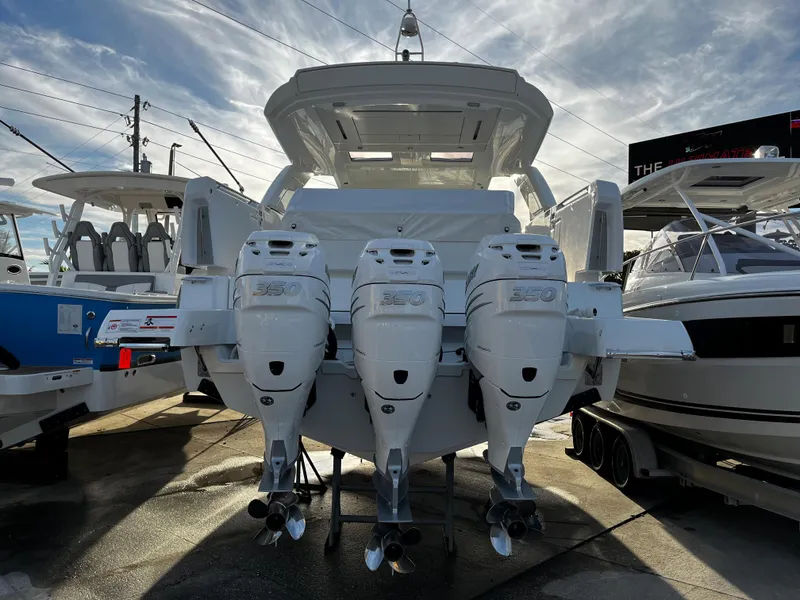 Slide: The Image of 2024 Jeanneau DB/43 OB boat with triple outboard engines. - 5