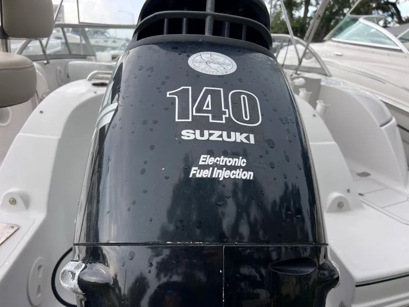 Slide: The Image of Suzuki 140 outboard motor on 2005 Starcraft Aurora 2210 I/O boat. - 5