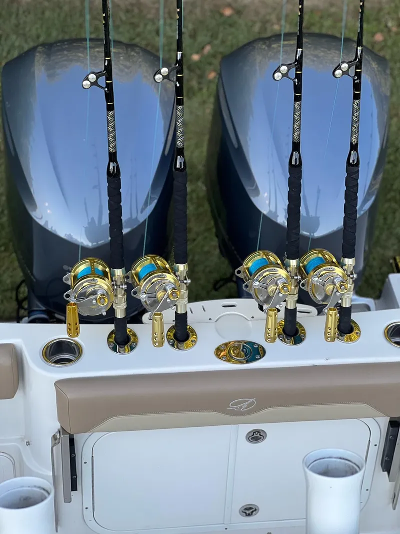 Slide: The Image of Fishing rods and reels on a 2018 Sailfish 290 CC boat. - 21