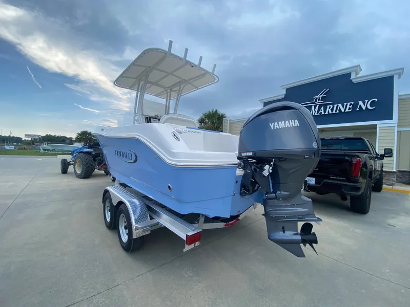 Slide: The Image of 2024 Robalo 202 EXPLORER boat with Yamaha engine on trailer at Marine NC dealership. - 4