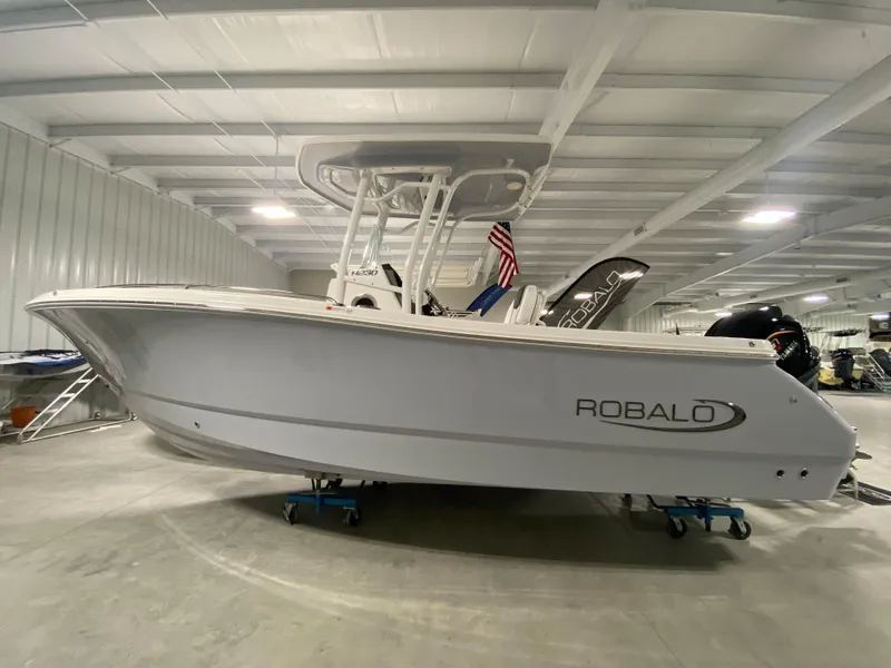 The Image of 2024 Robalo R230 Center Console boat in a showroom. - 0