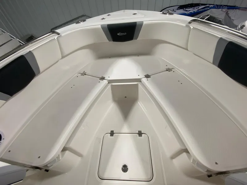 Slide: The Image of 2024 Robalo R230 Center Console boat interior, spacious seating and storage compartments. - 18