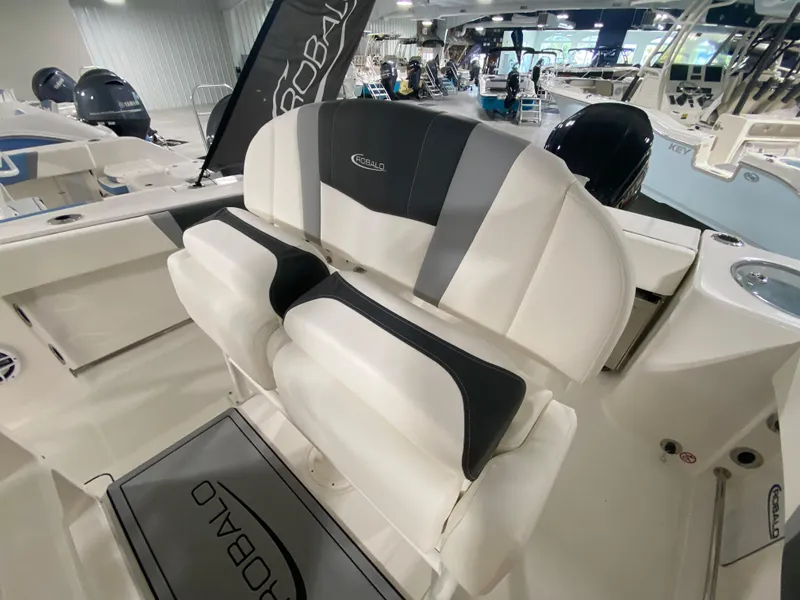 Slide: The Image of 2024 Robalo R230 Center Console boat interior seating and console. - 9
