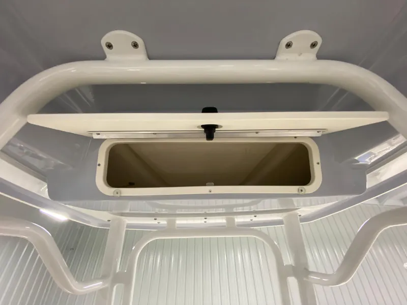 Slide: The Image of 2024 Robalo R230 Center Console storage compartment. - 13