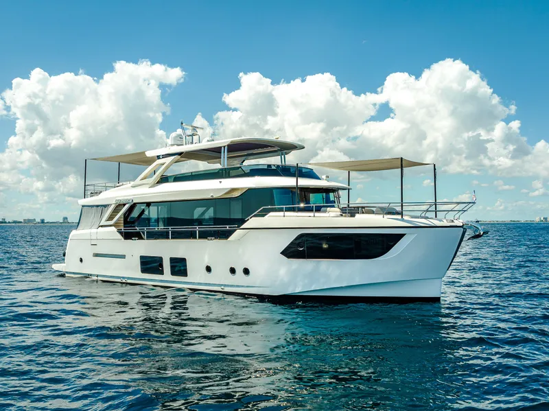 Slide: The Image of Luxury Absolute Navetta 73 yacht cruising on open water, 2022 model. - 0