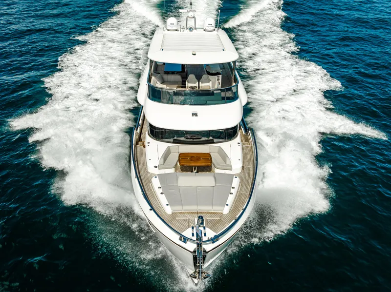 Slide: The Image of Luxury yacht Absolute Navetta 73 cruising on open sea, 2022 model. - 13