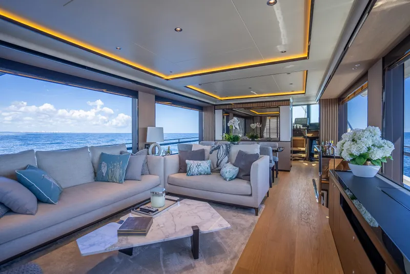 Slide: The Image of Luxurious interior of 2022 Absolute Navetta 73 yacht with elegant furnishings and ocean view. - 25