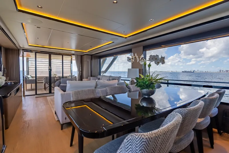 Slide: The Image of Luxurious interior of 2022 Absolute Navetta 73 yacht with ocean view and elegant furnishings. - 28