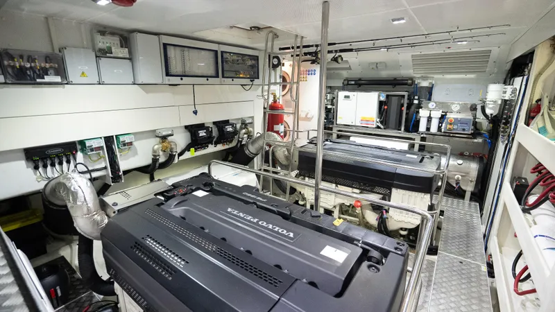 Slide: The Image of Engine room of 2022 Absolute Navetta 73 yacht with Volvo Penta engines. - 34